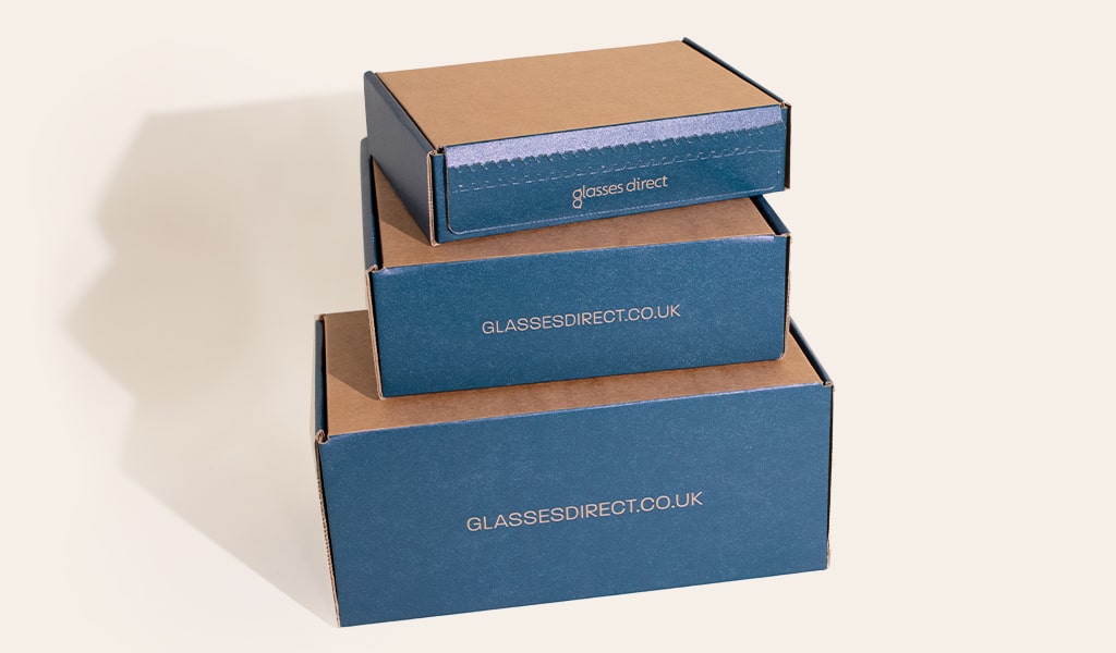 Glasses Direct new box packaging in 3 different sizes stacked on top of each other