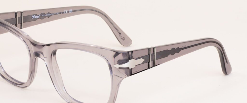 Square clear Persol frame with arms open angled facing to the left