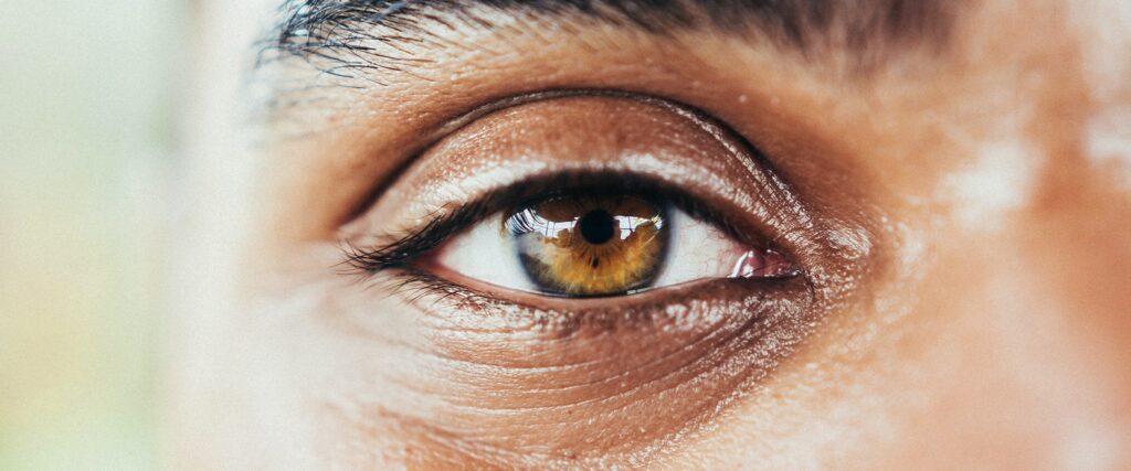 Male with Hazel coloured eyes looking straight at the camera