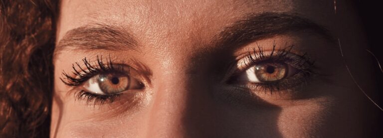 Woman with Hazel coloured eyes looking straight at the camera