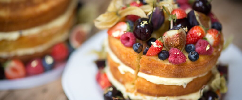 Victoria sponge cake with fruit and berries