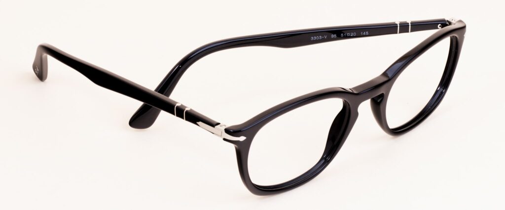 Pair of Persol black round frames facing to the right