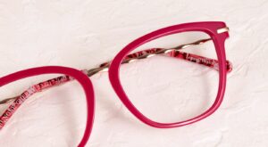 Close-up of Pink Cat-eye Scout Made in Italy frames coming from the left corner of the image