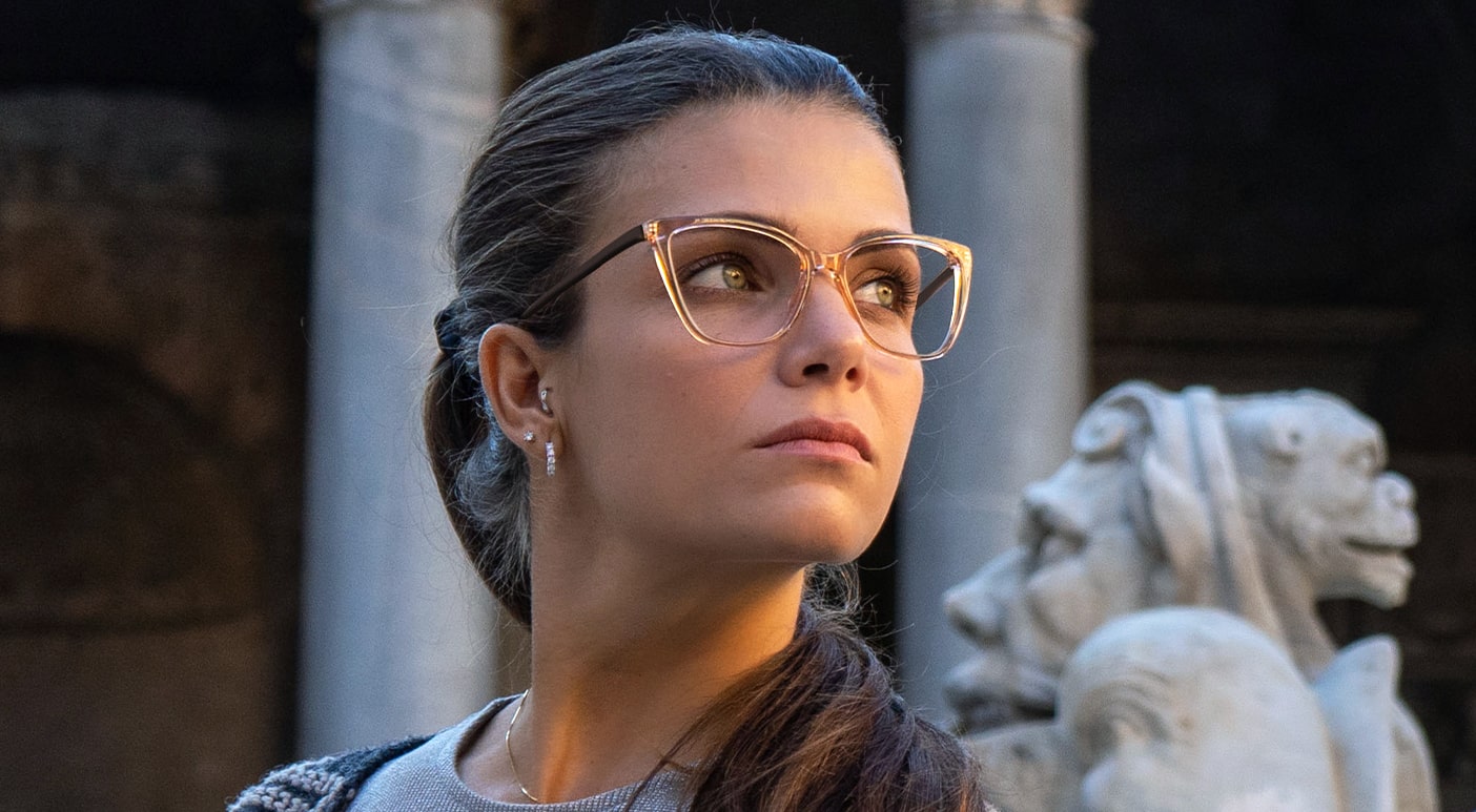 Woman wearing beige Scout Made in Italy frames outdoors looking right