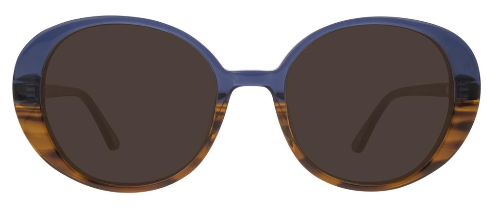 Sunglasses with large round lenses in an acetate frame that is blue in the top half and shows a brown wood grain in the bottom half